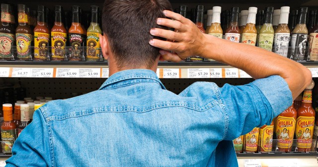 White Guy at Grocery Store Wondering Which Hot Sauce An Anti-Racist Would Buy