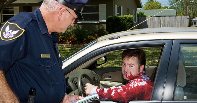 Blood-Soaked Man Desperately Explaining GWAR to Traffic Cop