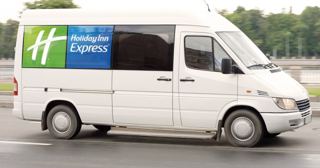 Retired Tour Van Enjoying Life as Holiday Inn Airport Shuttle