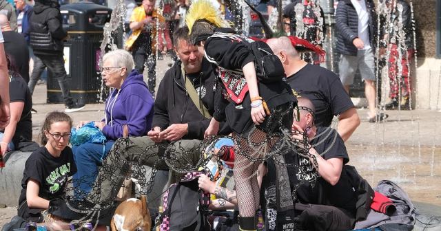 Punks With Chain Wallets Tangled Together Now Operating as Single Organism