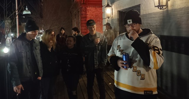 Man With Vape Musters Courage to Hang With Smokers Outside Show