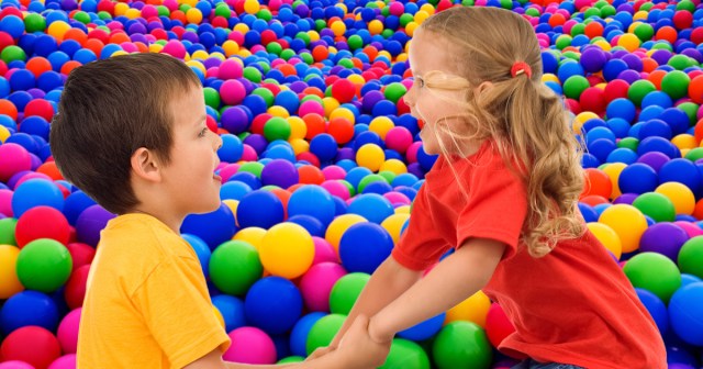 Hardcore Toddler at Chuck E. Cheese Stops Playing to Pick up Kid Knocked Down in Ball Pit