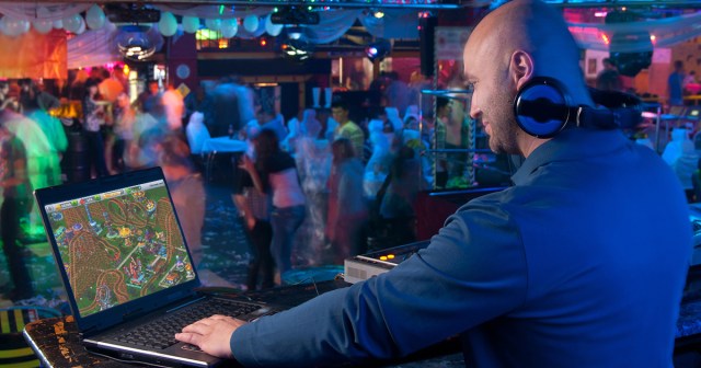 DJ Under Impression No One Can Tell He’s Playing Rollercoaster Tycoon up There
