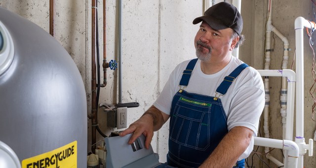 Dad At Basement Show Noticing All Sorts of Issues Hosts Are Gonna Have If They Don’t Update Plumbing Soon