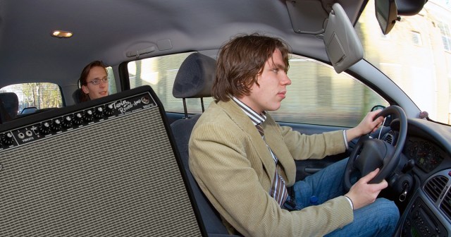 Jealous Bassist Wondering Why Amp Always Gets Front Seat