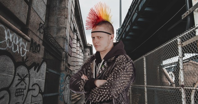 Man With Most Spikes on Jacket Must Be Strongest Punk of the Pack