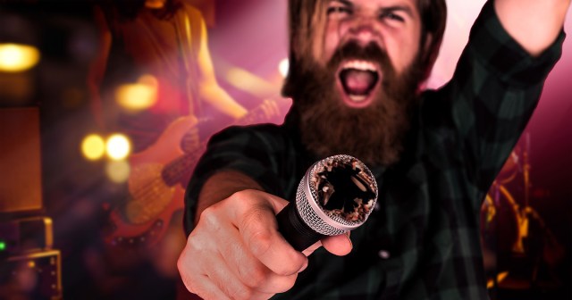 Hardcore Singer Pulls Back Half-Eaten Microphone After Holding It Into Crowd During Chorus