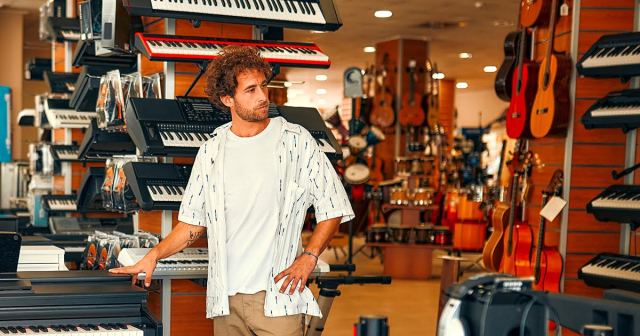 Man Fulfills Lifelong Dream Playing “Jump” Synth Intro at Every Guitar Center in U.S.