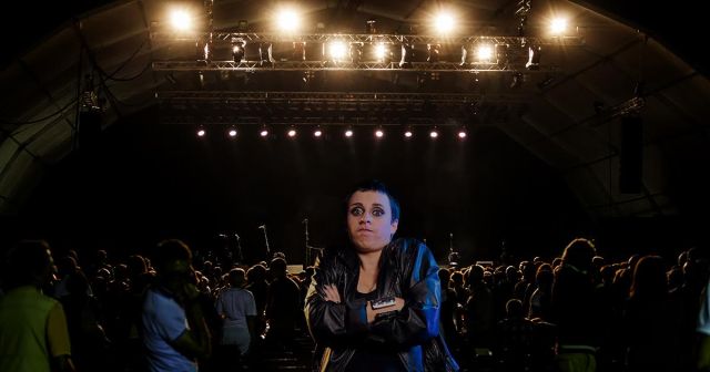 Woman at Dream Theater Show Just Happy to Not Have to Wait in Line for the Bathroom for Once
