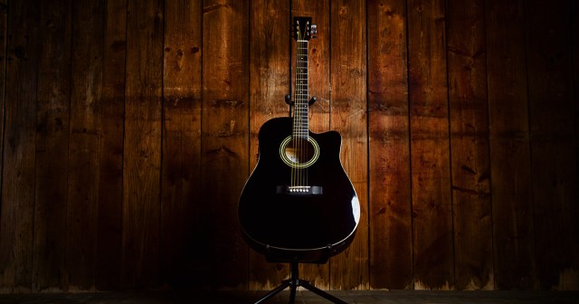 Neglected Acoustic Guitar Plays Itself to Sleep at Night