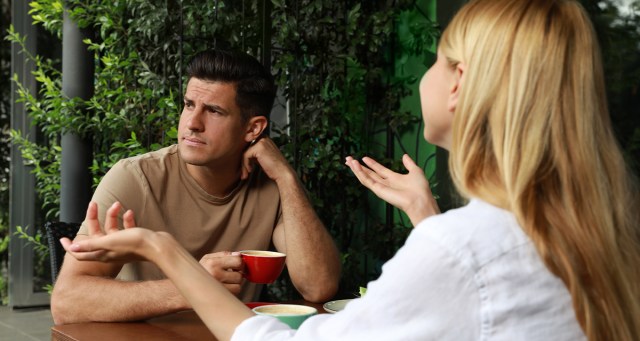 Man Out to Fancy Dinner with Girlfriend Stares Longingly at Dive Bar Across the Street