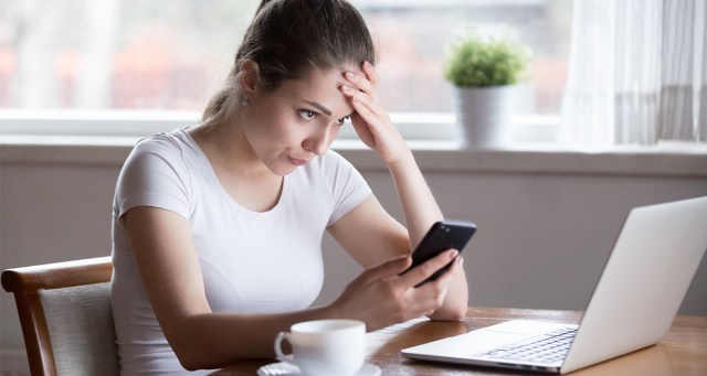 Woman Too Embarrassed to Answer Security Question About Favorite Band in High School