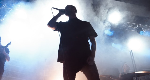 Hardcore Frontman Midway Through Rambling, Philosophical Monologue Informs Audience That All of Venue’s Doors and Windows Have Been Locked From the Outside