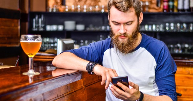 Inspiring: Introvert Breaks Out of His Shell by Going to a Bar To Look at His Phone