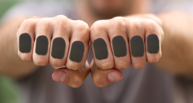 Blacked-Out Knuckle Tattoos Forces You to Assume the Worst
