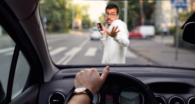 Embarrassed Pedestrian Frantically Tries to Switch Song He’s Listening to Before Car Hits Him