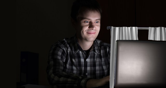 Man Nostalgic for Video Store Experience Builds Little Curtain Around Computer for Peeking at Porn