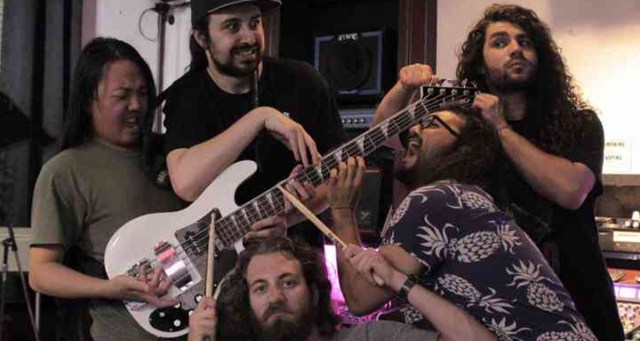 Band That Switches Instruments Accidentally All End Up on Same Bass After Wrong Turn