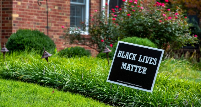 Neoliberal Couple Feels BLM Sign Really Ties 11 Bedroom, 6 Bath House Together
