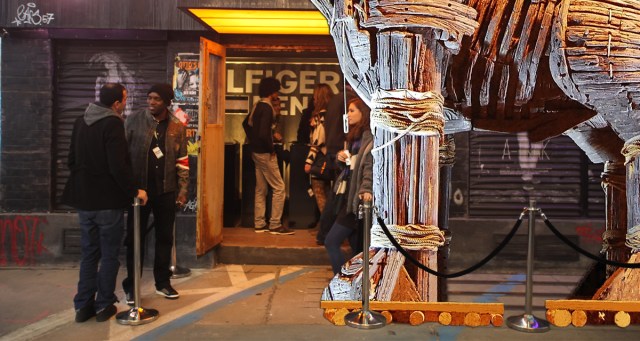 Bouncer Casually Lets Giant Wooden Horse Through