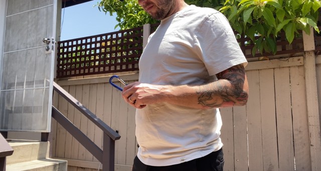 Man Busts Out the Good Carabiner Keychain for Special Red Chord Show