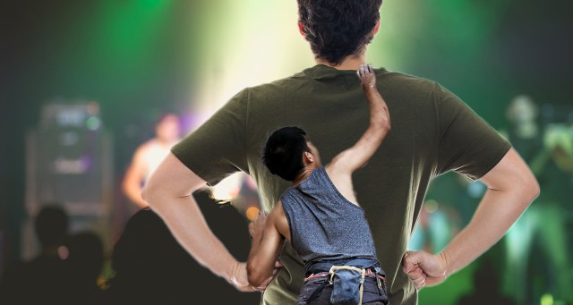 Punk Attempting to Free Climb 6’4” Man Blocking His View of Stage