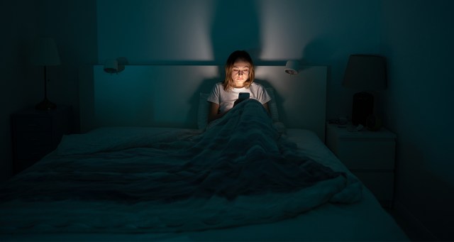 STUDY: Fuck It, Scrolling on Your Phone Before Bed Actually Good For You