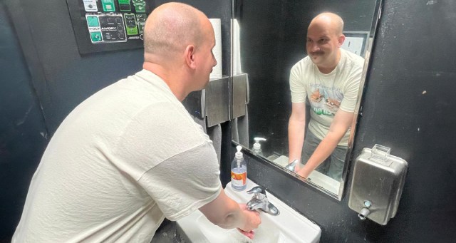 Showoff? This Guy is Washing Both His Hands After Using the Bathroom