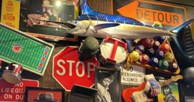 How I Get Meals Comped at TGI Friday’s by Sitting Under Loose Wall Decor