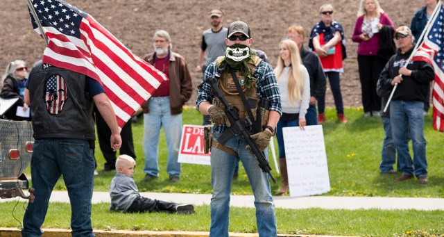 Masked Militia Member Harassing Voters in Line at Polling Location Forgot Where He Parked His Squad Car