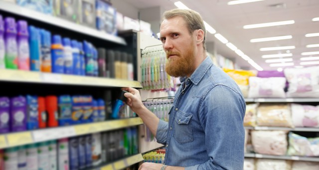 Man in Body Wash Aisle Debating Whether He Wants to Smell Like Wood or Stone