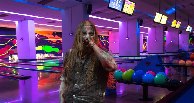 Black Metal Band Maintains Their Dark Atmosphere While Playing Sparsely Populated Bowling Alley