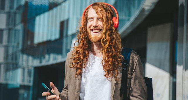 Dipshit Out on Walk With Headphones Definitely Picturing Self in Opening Scene of Movie
