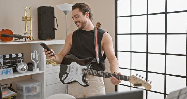 Guitarist’s Pre-show Warm Up Mainly Just Texting “No Worries” to All the People Who Aren’t Coming