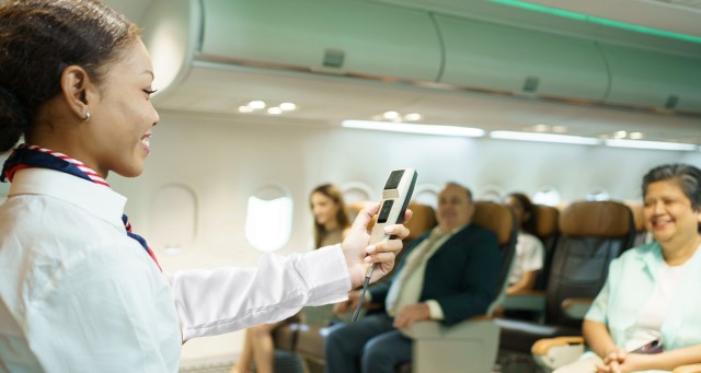 Punk Flight Attendant Gives Mic to Front Row Passengers During Pre-Flight Announcements