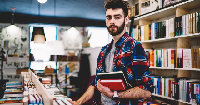 Man Clearly Going Through Something Buys Really Big Fantasy Book