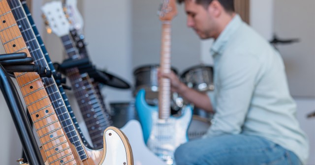 Local Man Owns Inappropriate Number of Guitars for Skill Level 