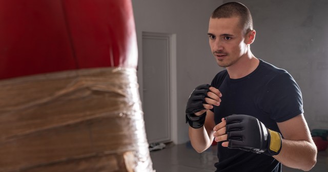 Firefighter Goes to Town on Punching Bag He Taped Photo of Fire To
